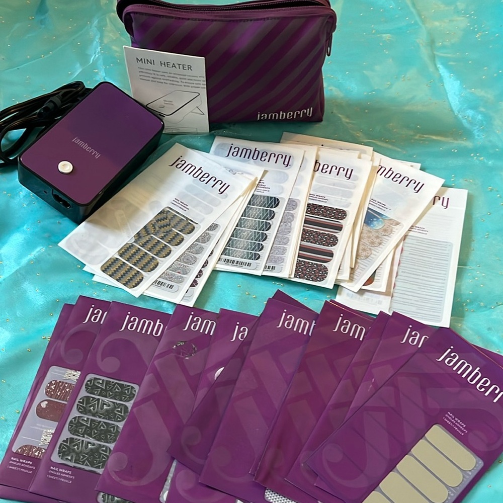Huge Jamberry lot, including stickers, a mini heater and carrying bag.